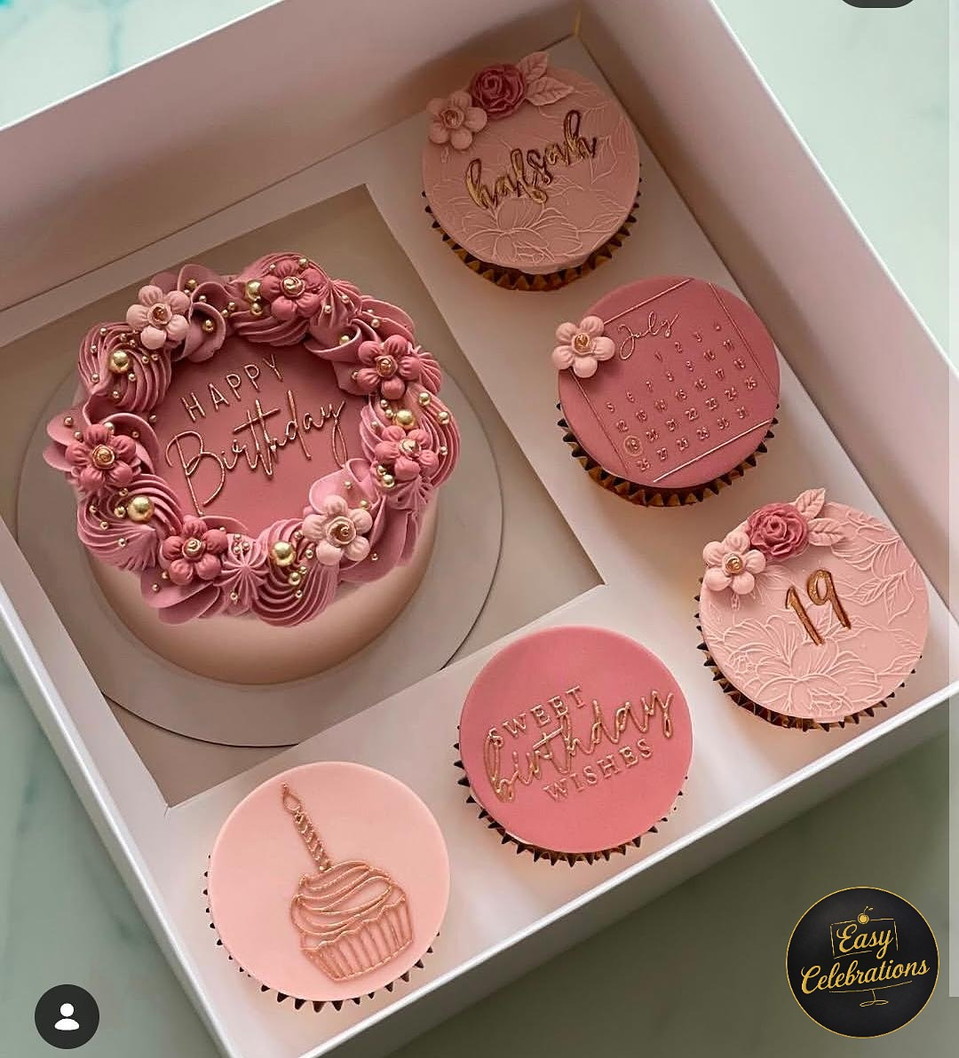 Pink Floral Birthday Cake and cupcakes